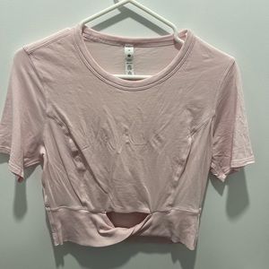 Pale pink Lululemon crop top